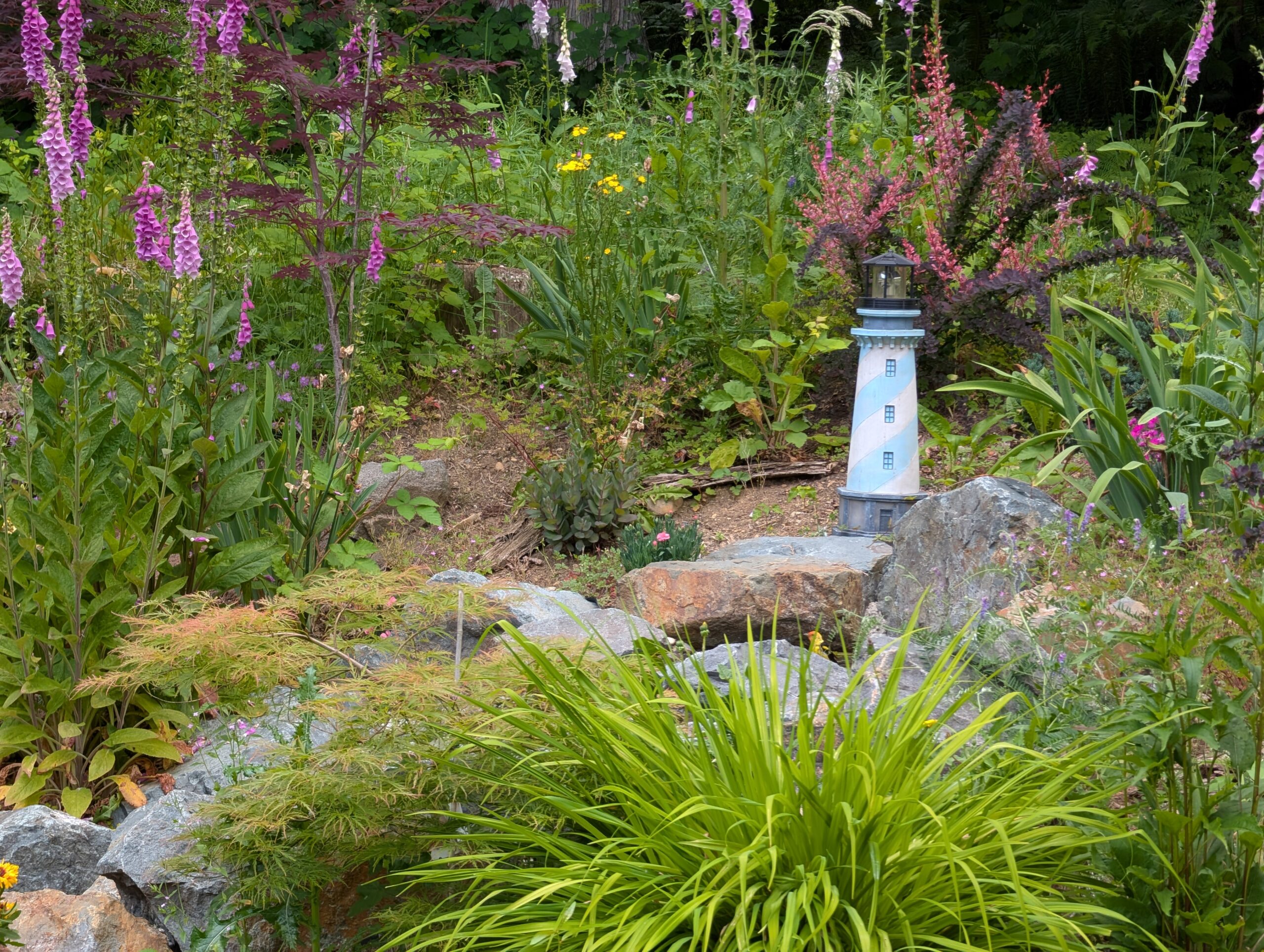 Decorative lighthouse in garden